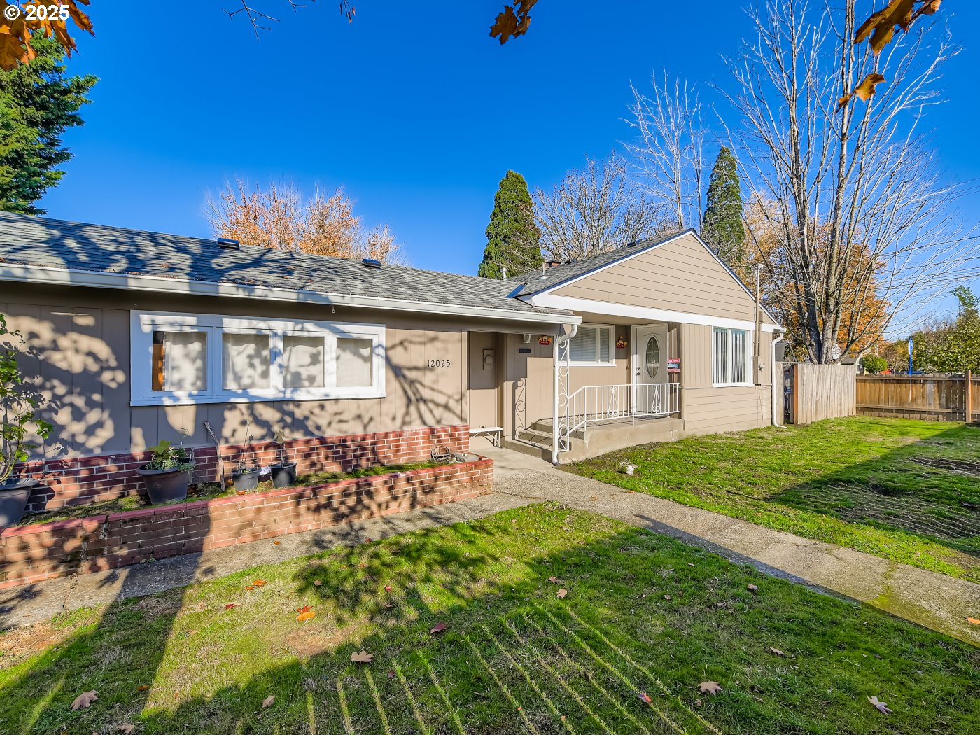 12025 Southwest 9th Street Beaverton, OR 97005 - Photo 16 of 22 a house view with a garden space