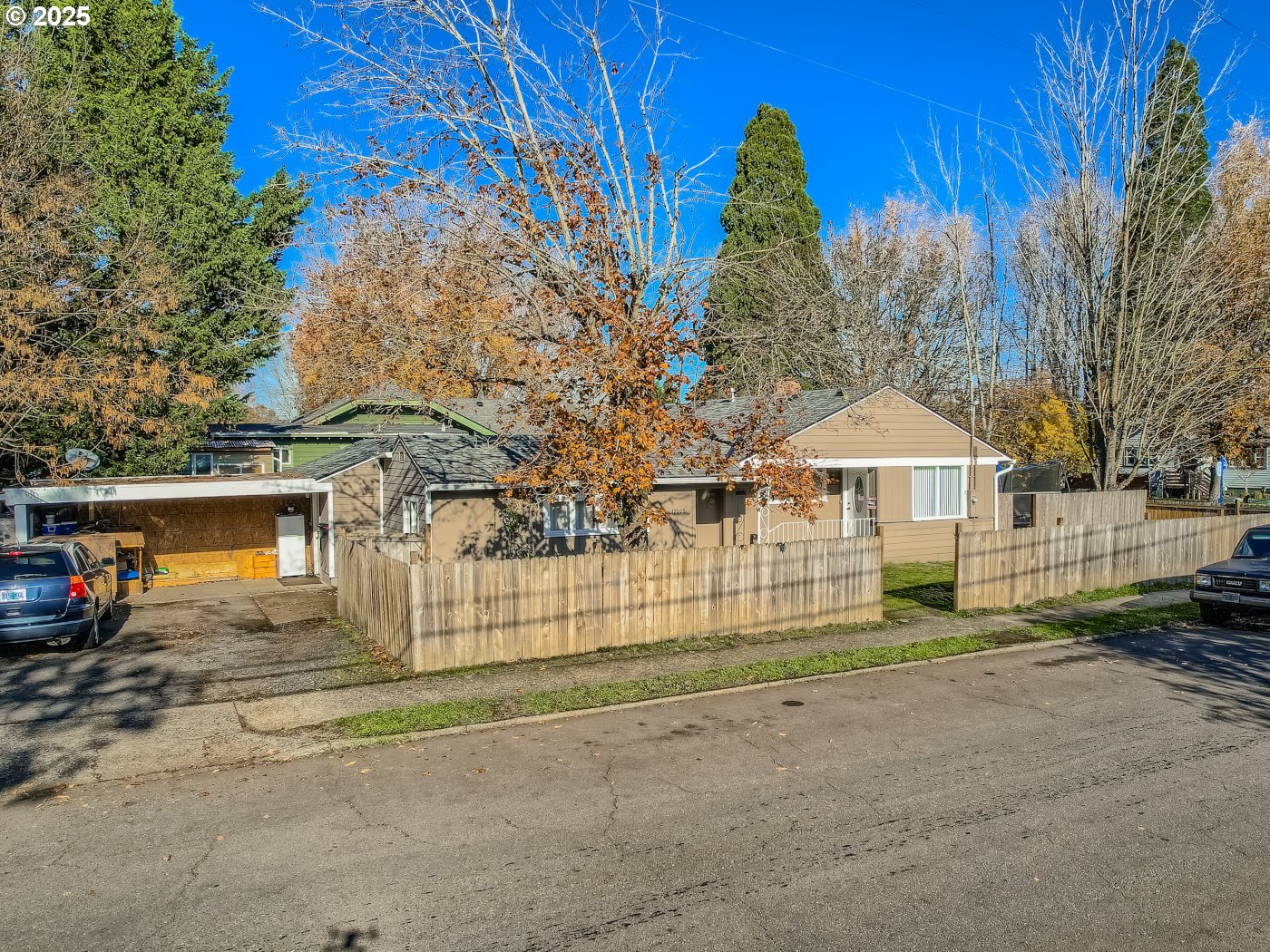 12025 Southwest 9th Street Beaverton, OR 97005 - Photo 2 of 22 a view of a yard in front of a house