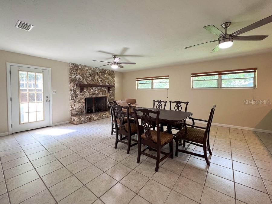 3920 Southwest 21st Street Gainesville, FL 32608 - Photo 13 of 40 a view of a dining room with furniture
