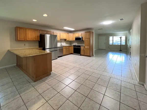 a view of kitchen with windows