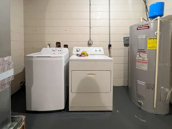 a utility room with dryer and washer