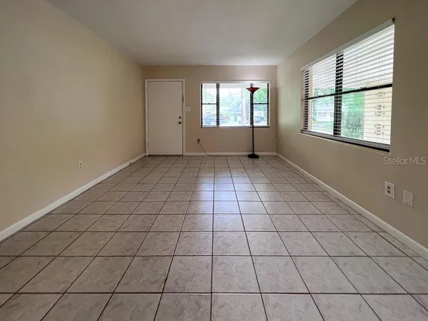 a view of an empty room and window