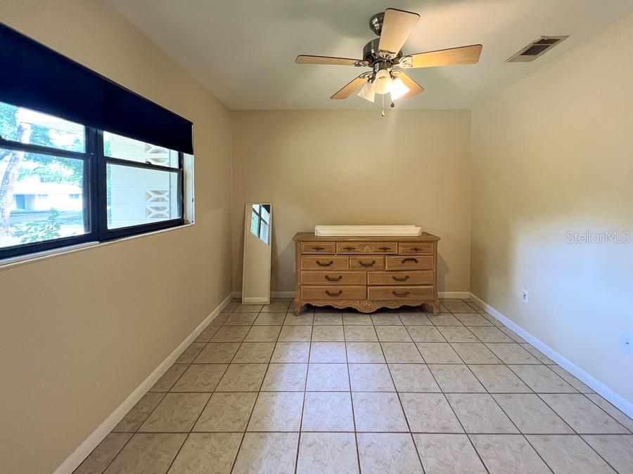 3920 Southwest 21st Street Gainesville, FL 32608 - Photo 23 of 40 a view of an empty room with a window