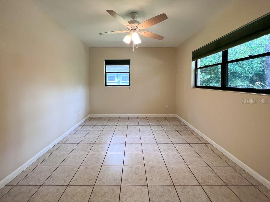 3920 Southwest 21st Street Gainesville, FL 32608 - Photo 27 of 40 a view of an empty room and window