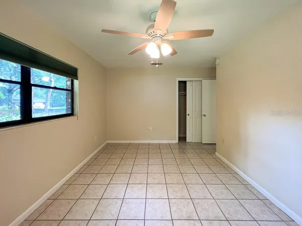 a view of an empty room and window