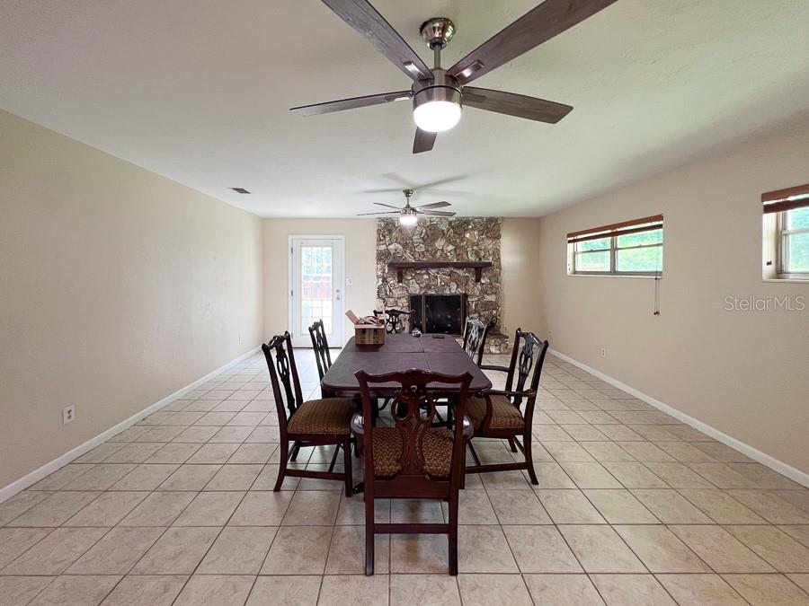 3920 Southwest 21st Street Gainesville, FL 32608 - Photo 5 of 40 a view of a dining room with furniture