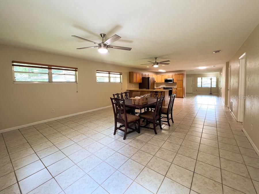 3920 Southwest 21st Street Gainesville, FL 32608 - Photo 6 of 40 a view of a dining room with furniture