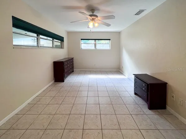 a view of an empty room and window