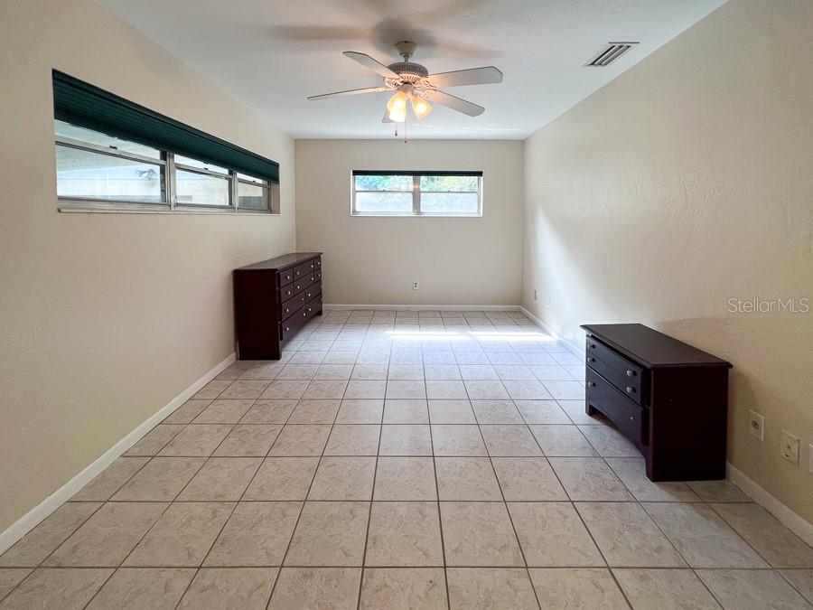 3920 Southwest 21st Street Gainesville, FL 32608 - Photo 9 of 40 a view of an empty room and window