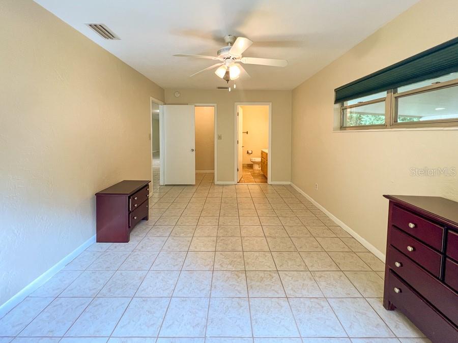 3920 Southwest 21st Street Gainesville, FL 32608 - Photo 10 of 40 a view of an empty room with a window