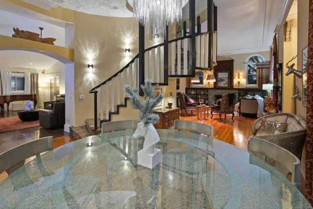 a bathroom with a sink toilet and mirror