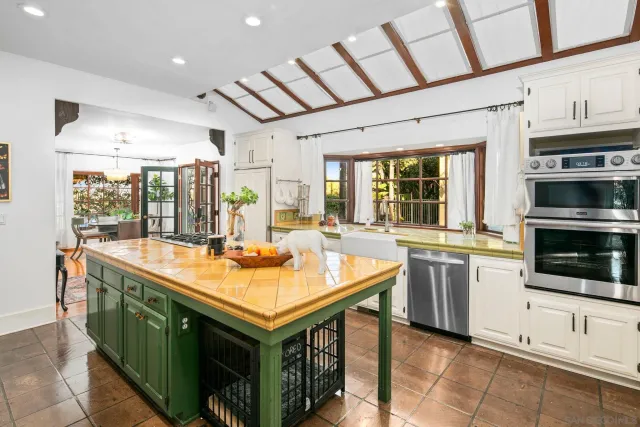 a front view of a house with wooden floor and windows