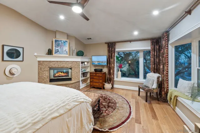 a kitchen with stainless steel appliances a stove a microwave and a refrigerator