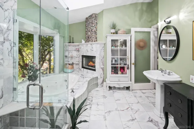 a view of a city with mountains in the background