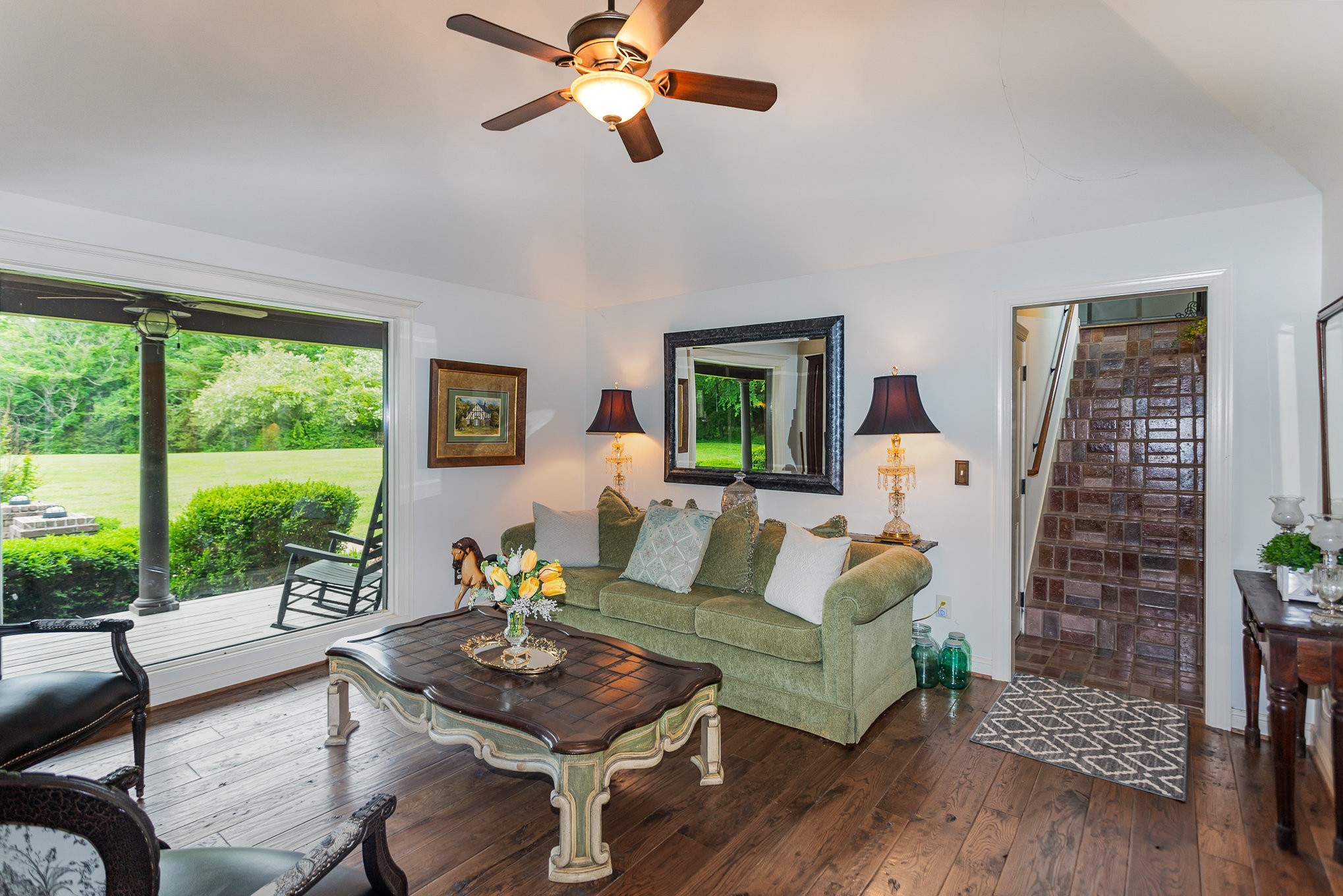 884 Pinnacle Hill Road Kingston Springs, TN 37082 - Photo 13 of 55 a living room with furniture and a large window