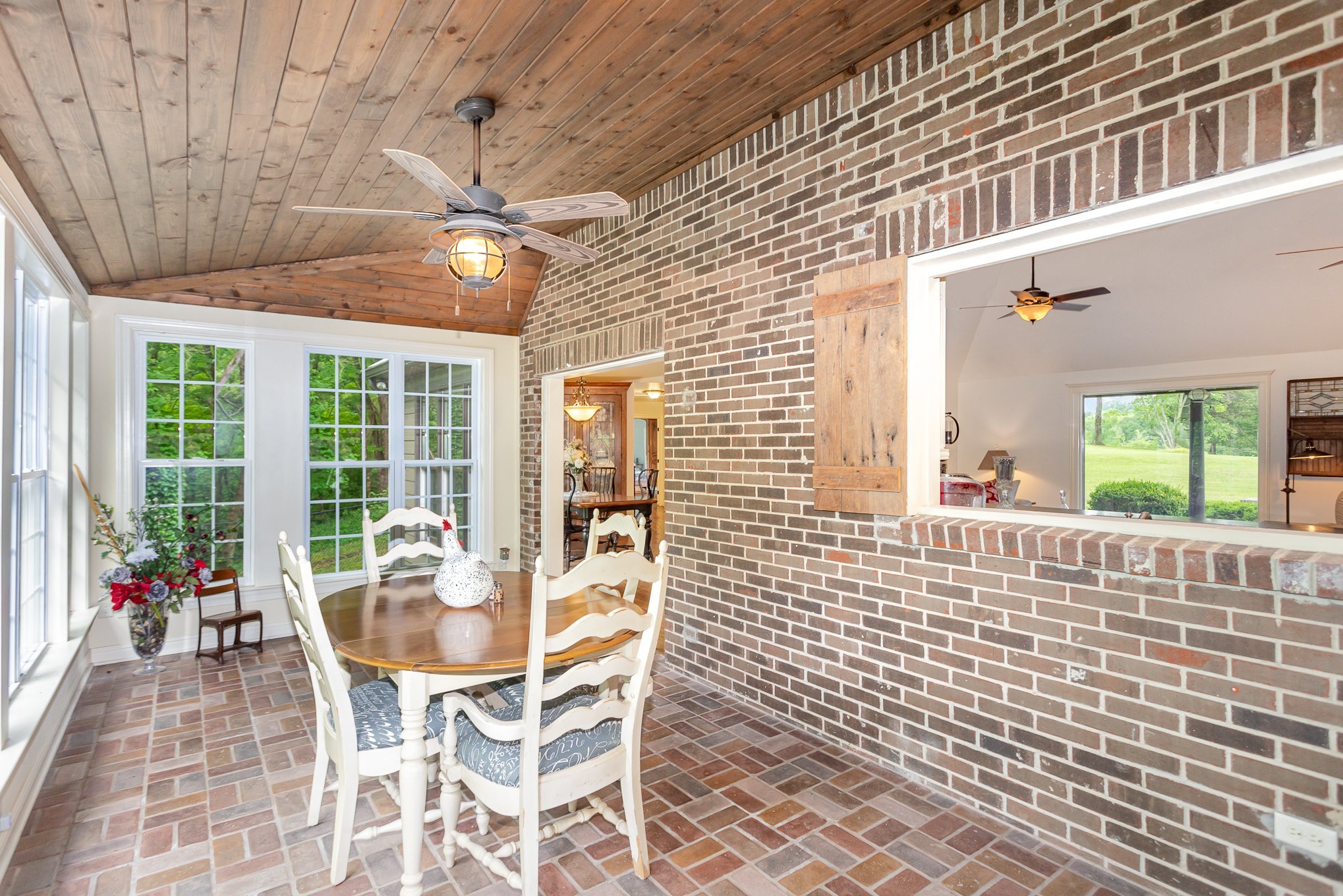 884 Pinnacle Hill Road Kingston Springs, TN 37082 - Photo 18 of 55 a dining room with furniture and window