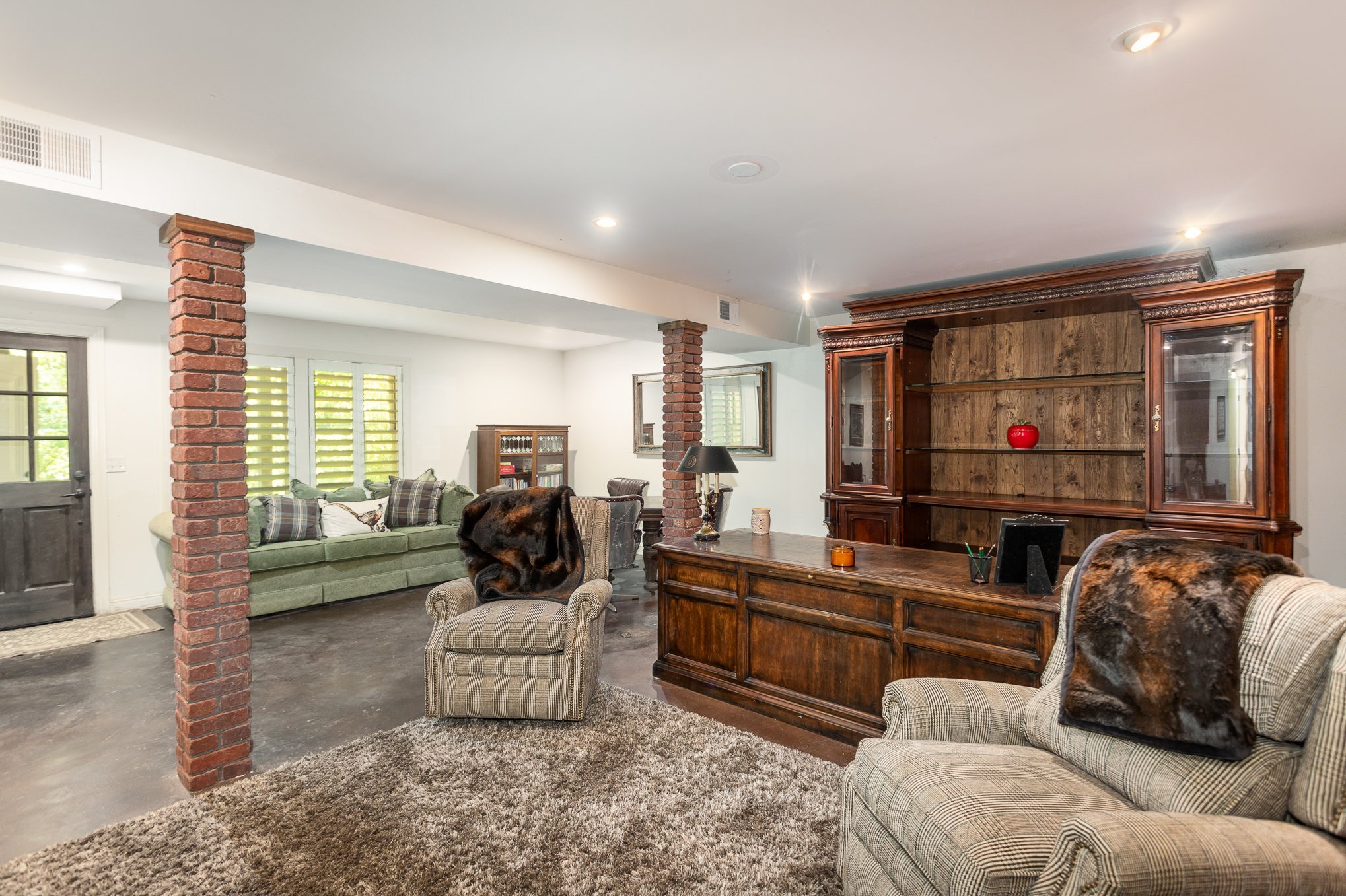 884 Pinnacle Hill Road Kingston Springs, TN 37082 - Photo 33 of 55 a living room with furniture and a flat screen tv