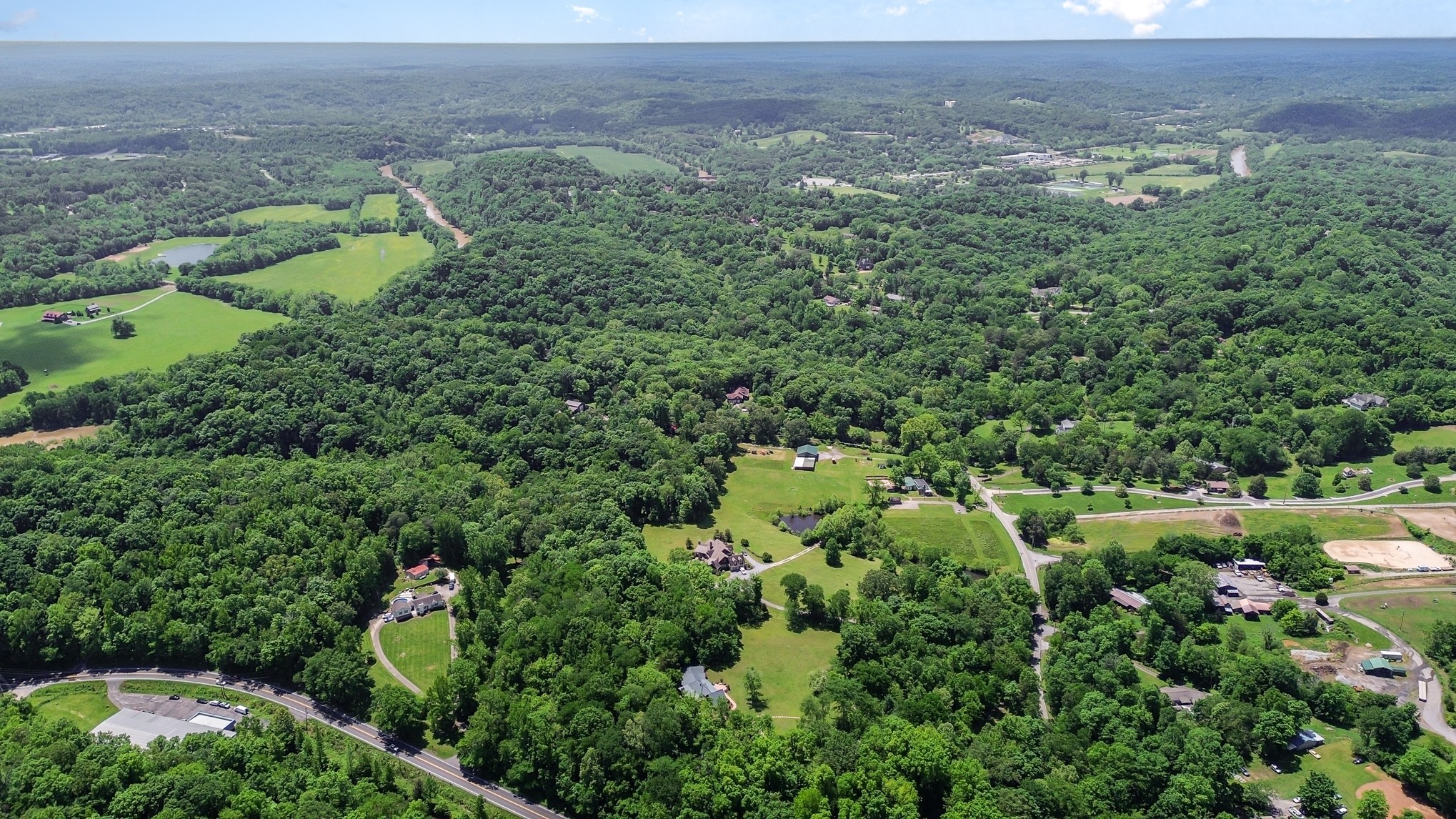 884 Pinnacle Hill Road Kingston Springs, TN 37082 - Photo 47 of 55 an aerial view of houses with yard
