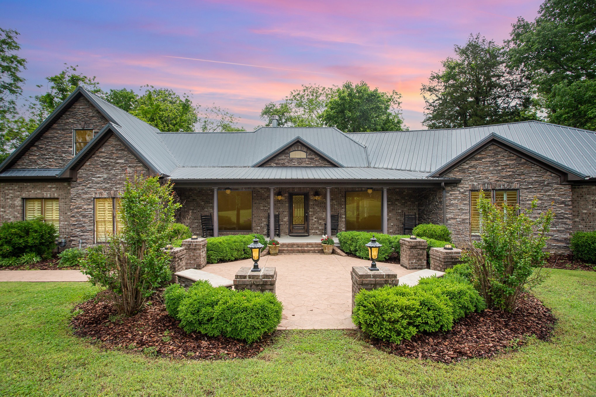 884 Pinnacle Hill Road Kingston Springs, TN 37082 - Photo 52 of 55 a front view of a house with garden