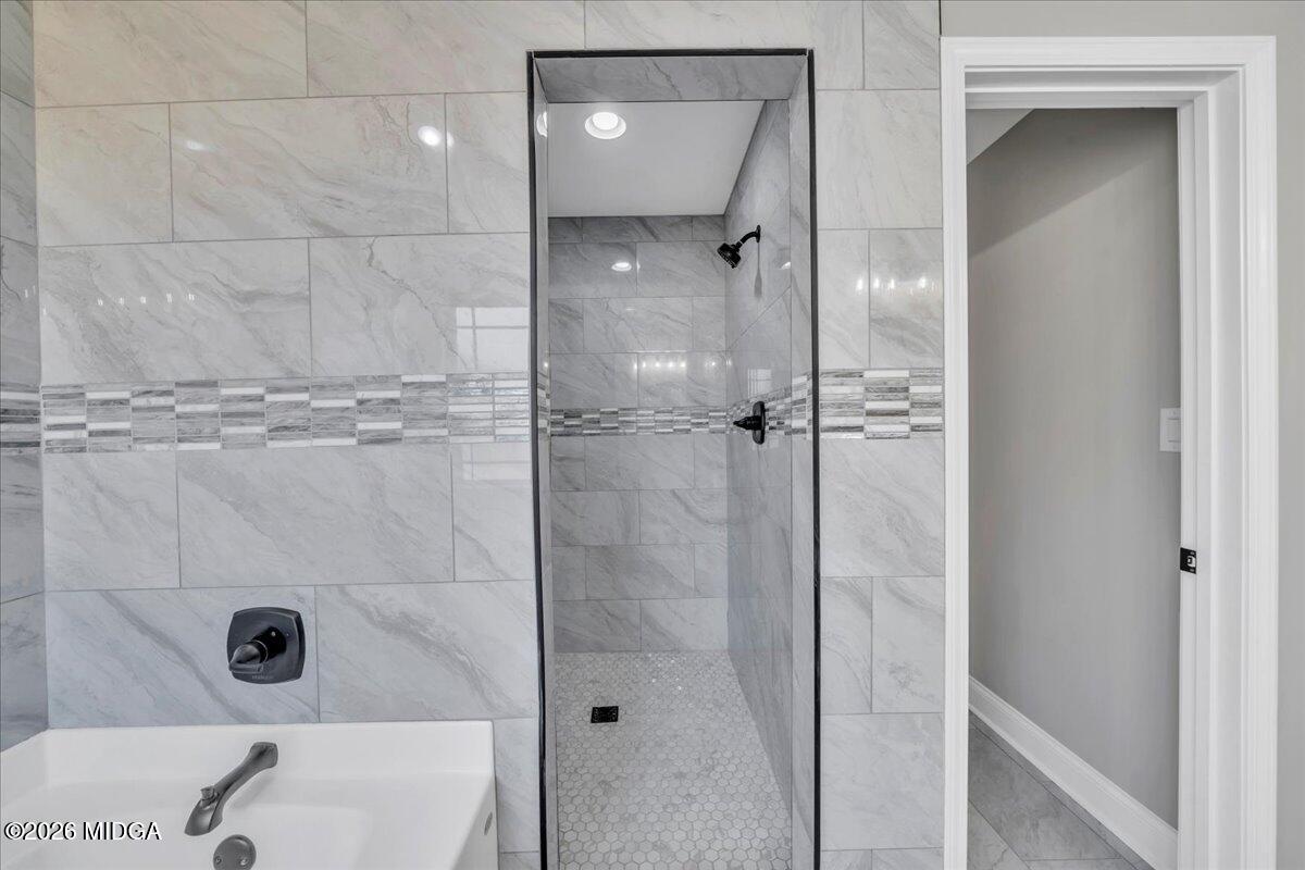 104 Early Drive Byron, GA 31008 - Photo 34 of 58 a bathroom with a shower and a sink