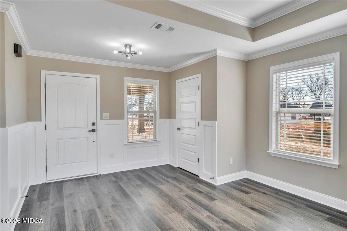 104 Early Drive Byron, GA 31008 - Photo 7 of 58 a view of an empty room with window and wooden floor