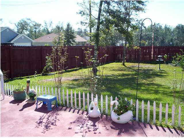 6755 Cedar Ridge Circle Milton, FL 32570 - Photo 12 of 13 Part of back patio and back yard.