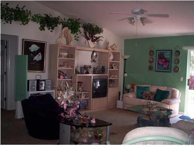 6755 Cedar Ridge Circle Milton, FL 32570 - Photo 4 of 13 Left side of living room, looking toward back of home.