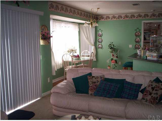 6755 Cedar Ridge Circle Milton, FL 32570 - Photo 7 of 13 Slider door, covered with blinds, to left of breakfast nook.