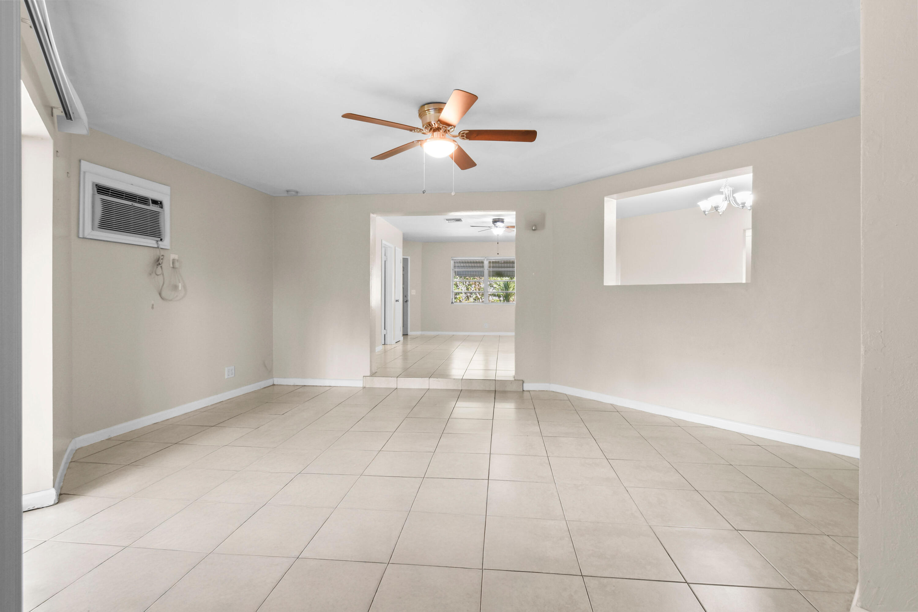 356 Cedar Avenue Tequesta, FL 33469 - Photo 22 of 51 a view of an empty room with a window
