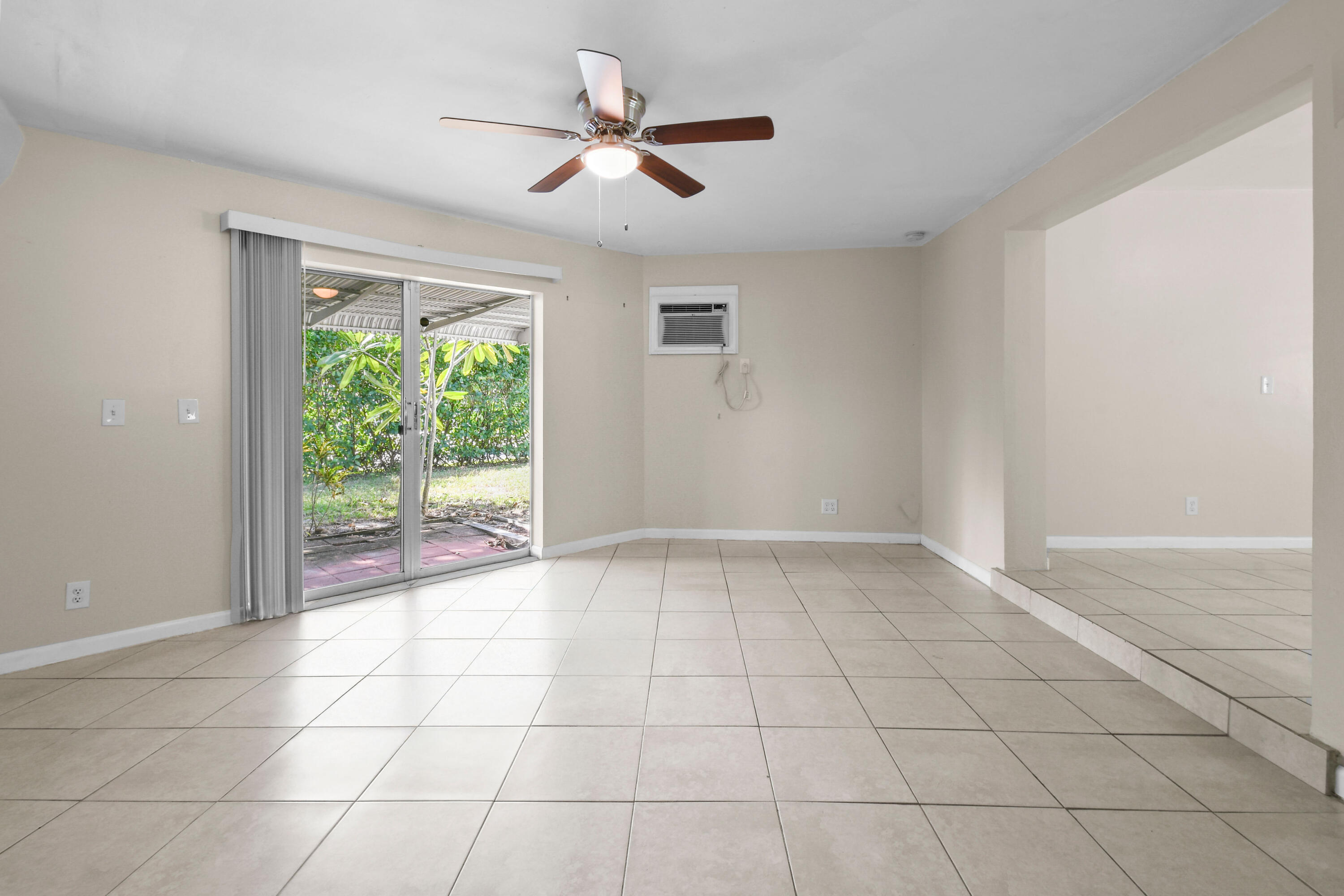 356 Cedar Avenue Tequesta, FL 33469 - Photo 23 of 51 a view of an empty room with a window