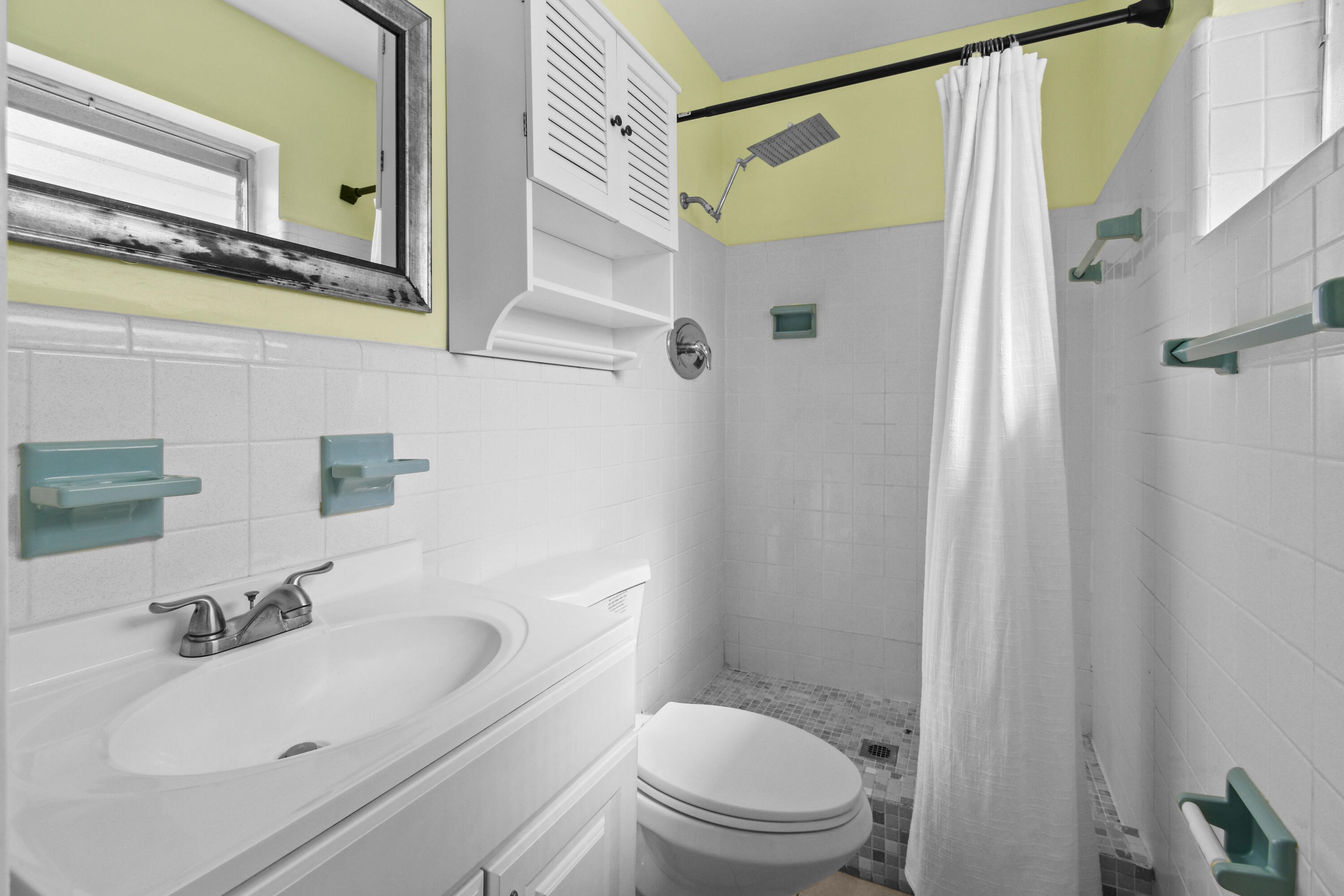 356 Cedar Avenue Tequesta, FL 33469 - Photo 29 of 51 a bathroom with a sink toilet and shower