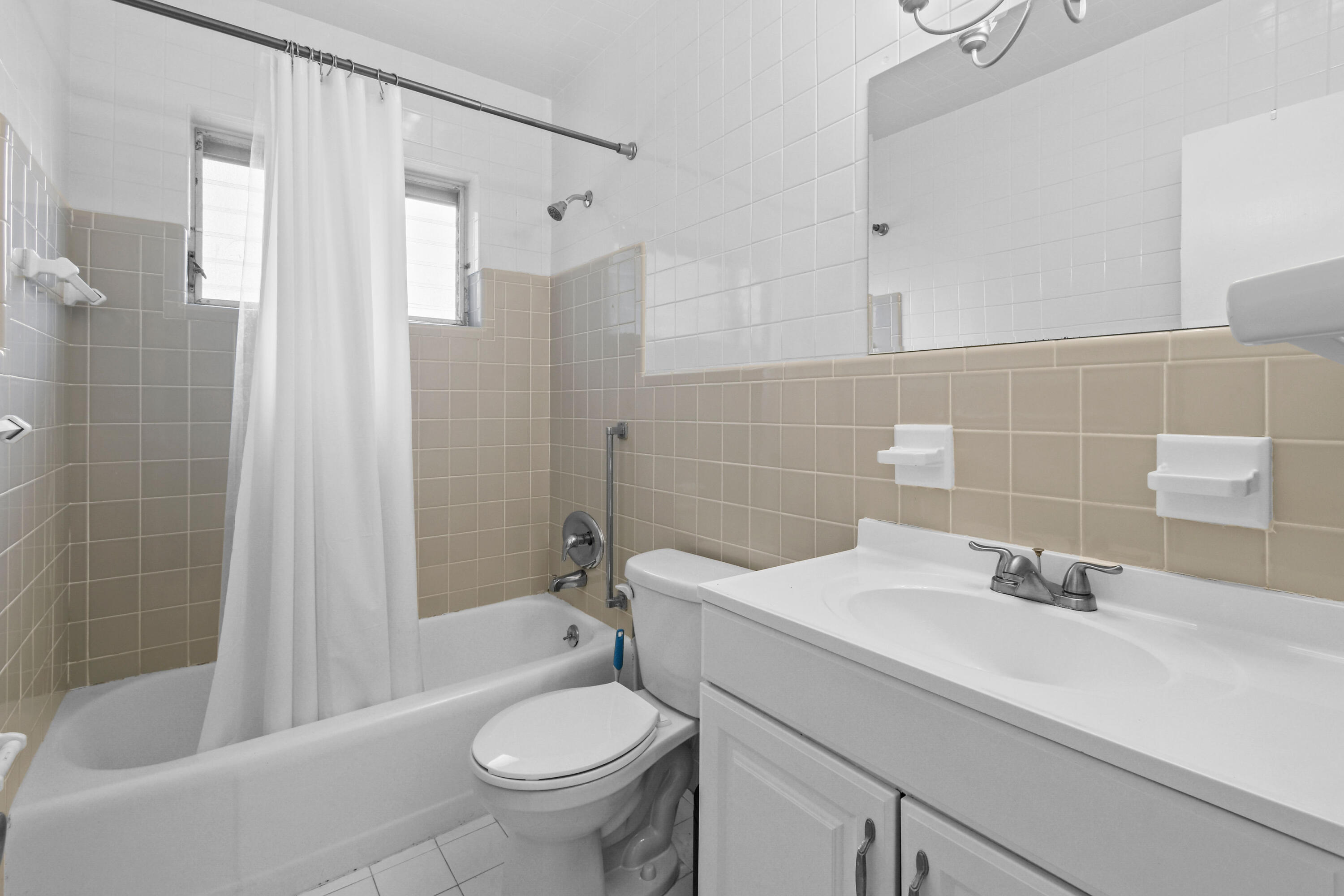356 Cedar Avenue Tequesta, FL 33469 - Photo 35 of 51 a bathroom with a sink a toilet and shower