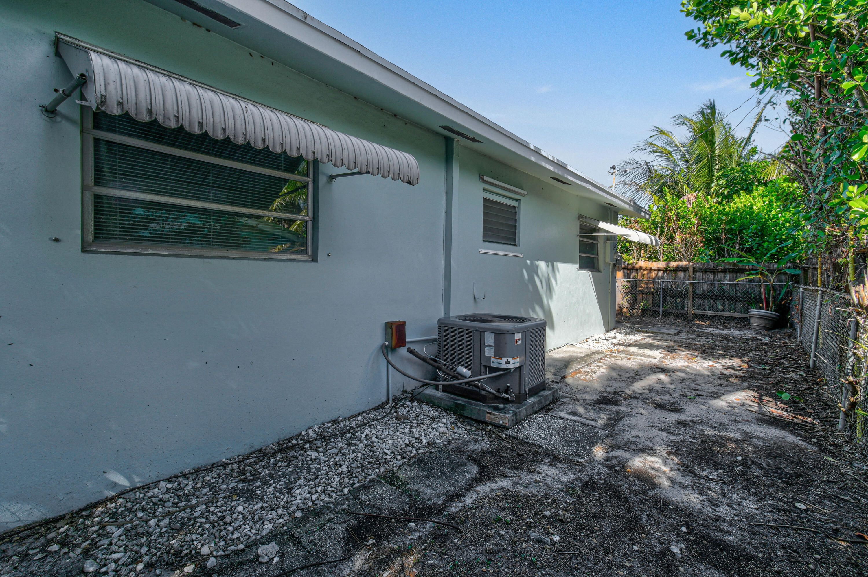 356 Cedar Avenue Tequesta, FL 33469 - Photo 47 of 51 a view of a backyard with sitting area