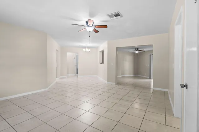 a view of a livingroom and a bathroom