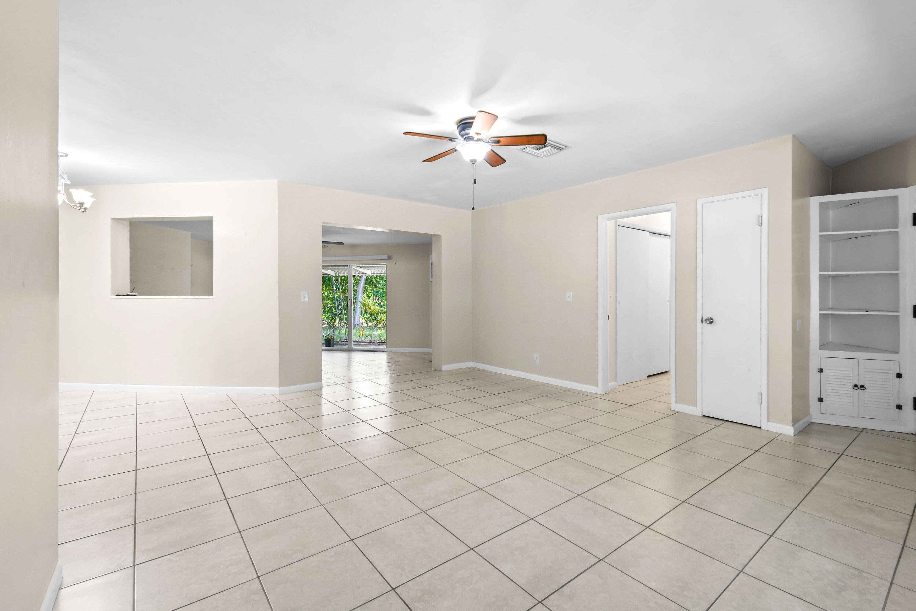 356 Cedar Avenue Tequesta, FL 33469 - Photo 8 of 51 a view of an empty room and window