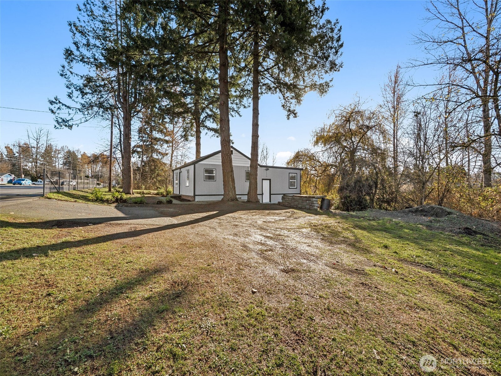 12535 Southeast Kent-Kangley Road Kent, WA 98030 - Photo 2 of 11 a view of road with large trees