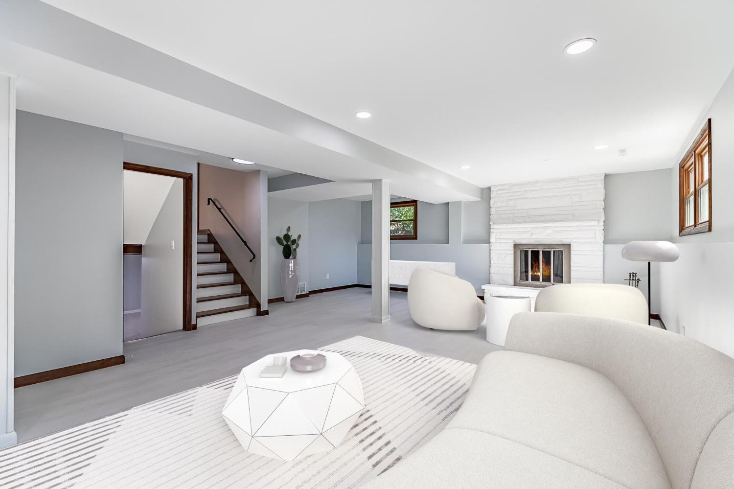 8551 Garfield Avenue Munster, IN 46321 - Photo 11 of 39 a bedroom with furniture and a fireplace