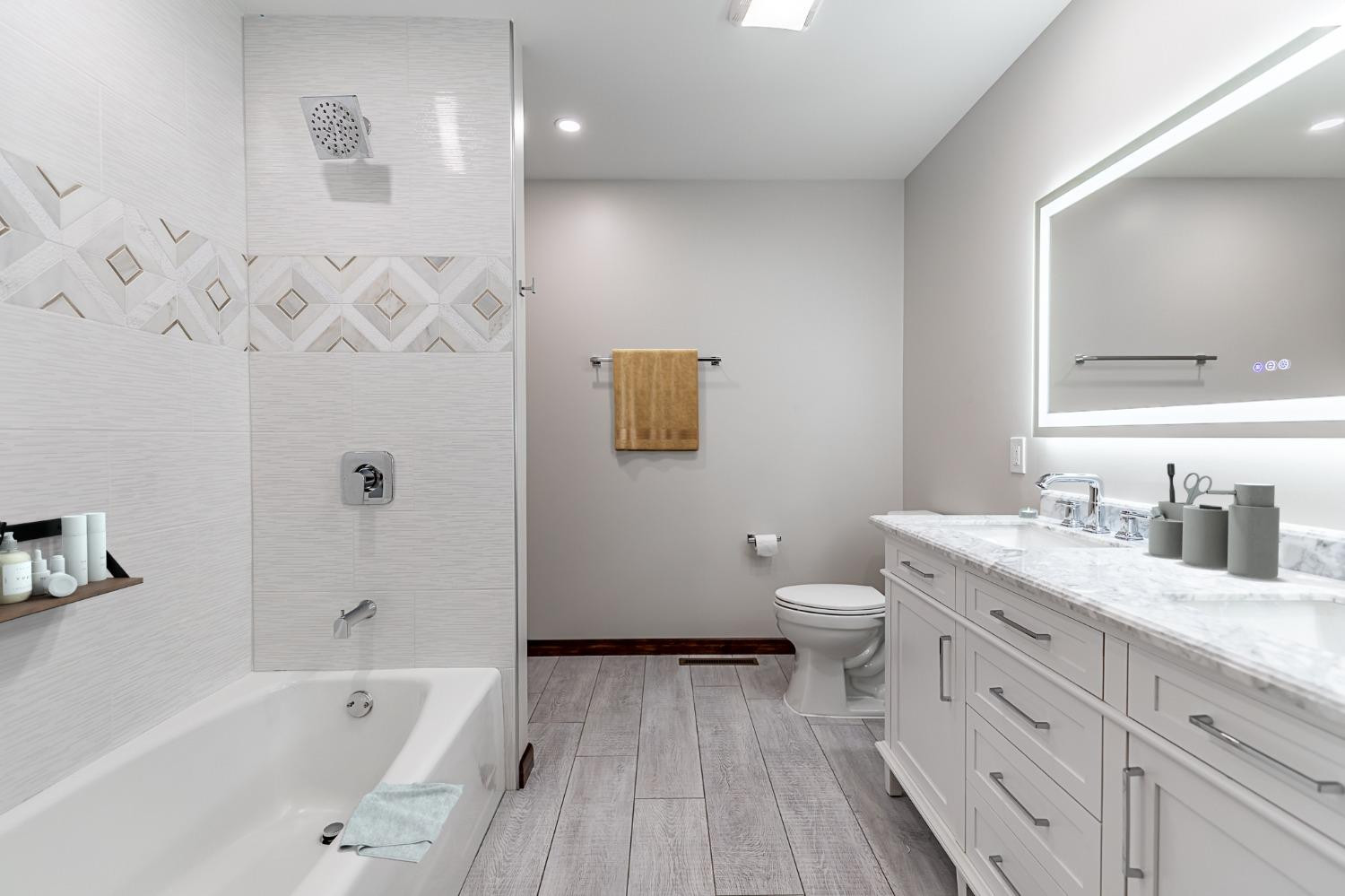 8551 Garfield Avenue Munster, IN 46321 - Photo 14 of 39 a bathroom with a granite countertop sink toilet and shower