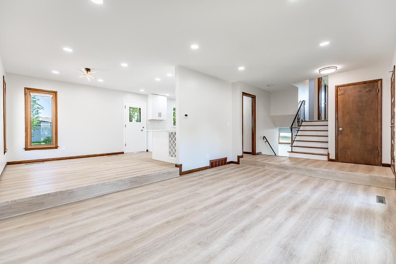 8551 Garfield Avenue Munster, IN 46321 - Photo 17 of 39 an empty room with wooden floor and windows