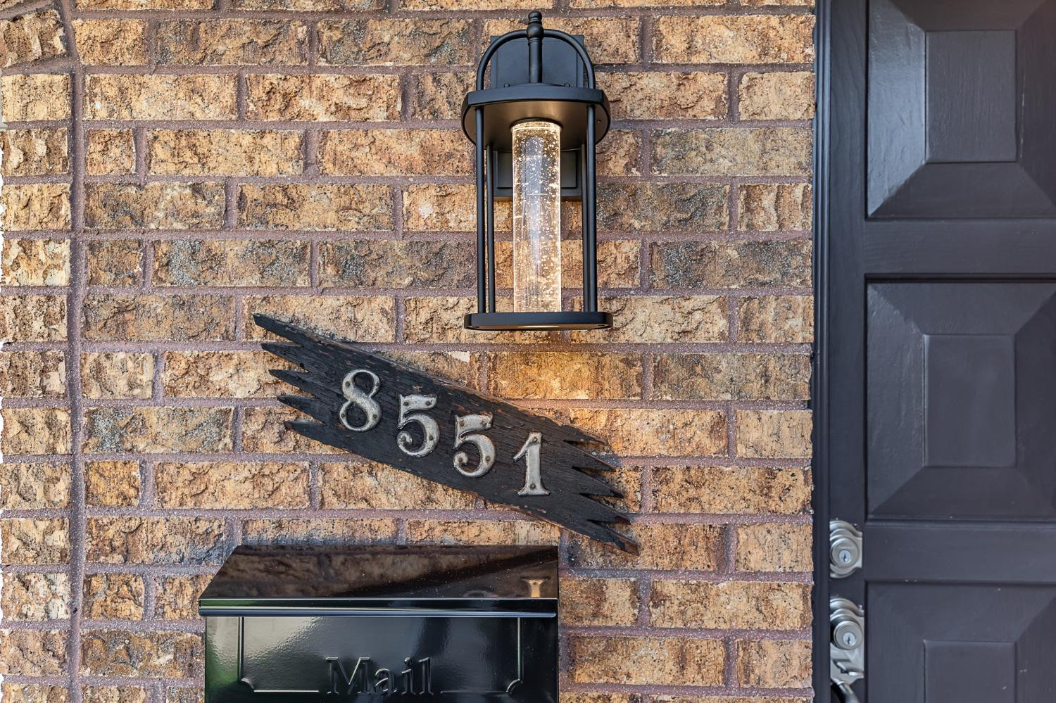 8551 Garfield Avenue Munster, IN 46321 - Photo 3 of 39 a close view of a stove top oven and sitting space