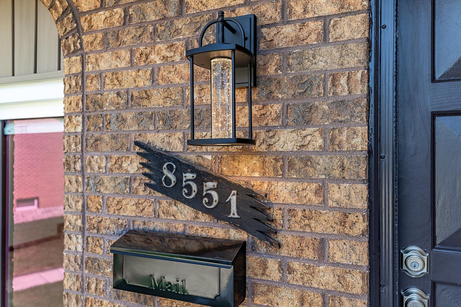 8551 Garfield Avenue Munster, IN 46321 - Photo 39 of 39 a brick building with a sign on it
