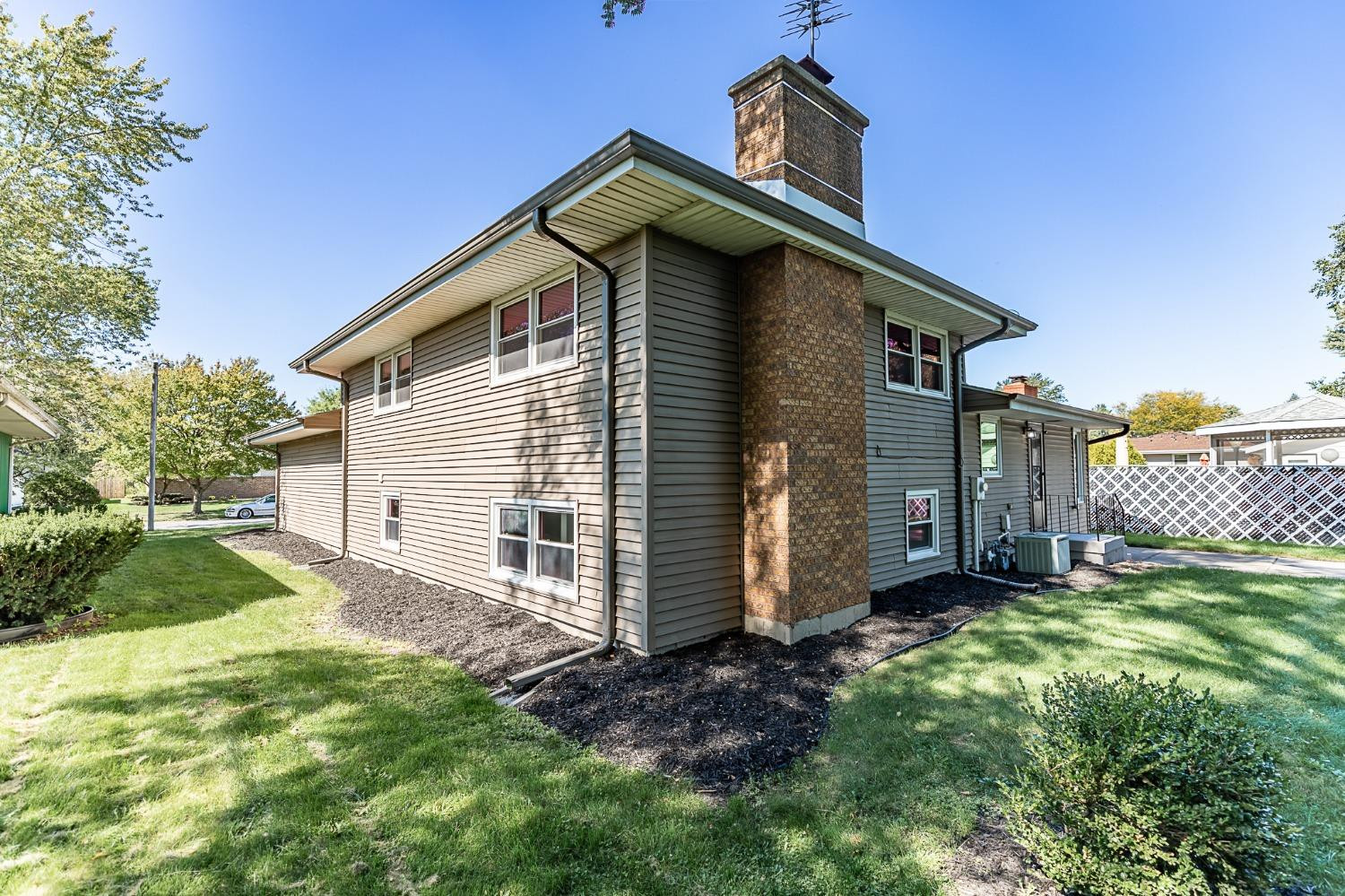 8551 Garfield Avenue Munster, IN 46321 - Photo 4 of 39 a view of a house with a yard