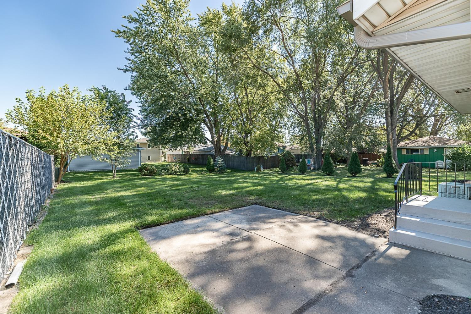 8551 Garfield Avenue Munster, IN 46321 - Photo 5 of 39 a view of a park with large trees