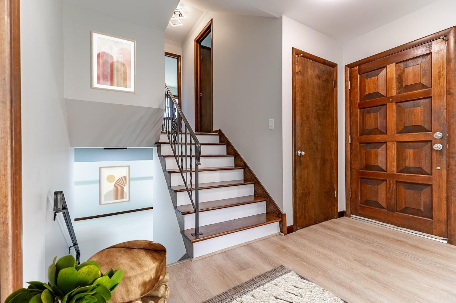8551 Garfield Avenue Munster, IN 46321 - Photo 9 of 39 a view of entryway and hall with wooden floor