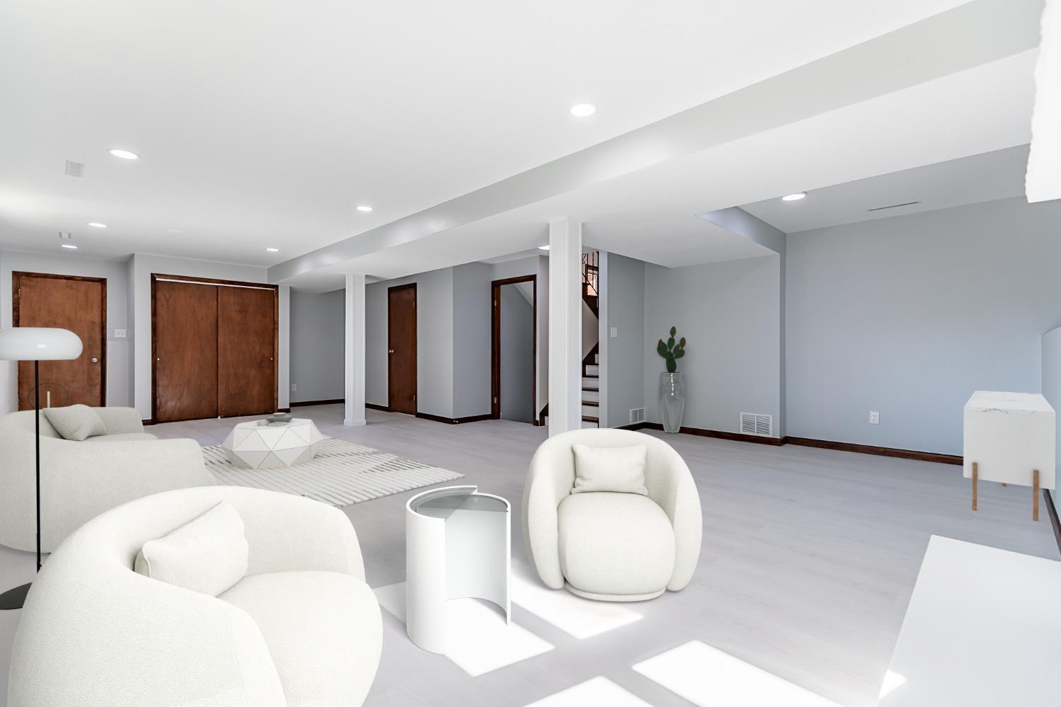 8551 Garfield Avenue Munster, IN 46321 - Photo 10 of 39 a spacious bedroom with a bed and a couch