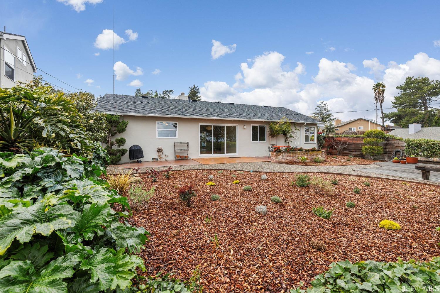 3101 Sunset Terrace San Mateo, CA 94403 - Photo 21 of 24 a front view of a house with garden