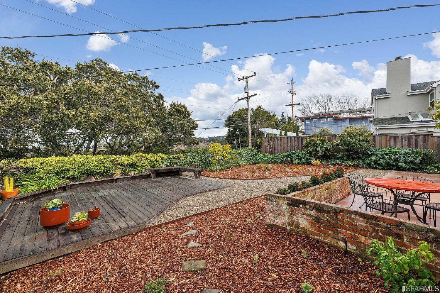 3101 Sunset Terrace San Mateo, CA 94403 - Photo 23 of 24 a view of a terrace with a table and chairs