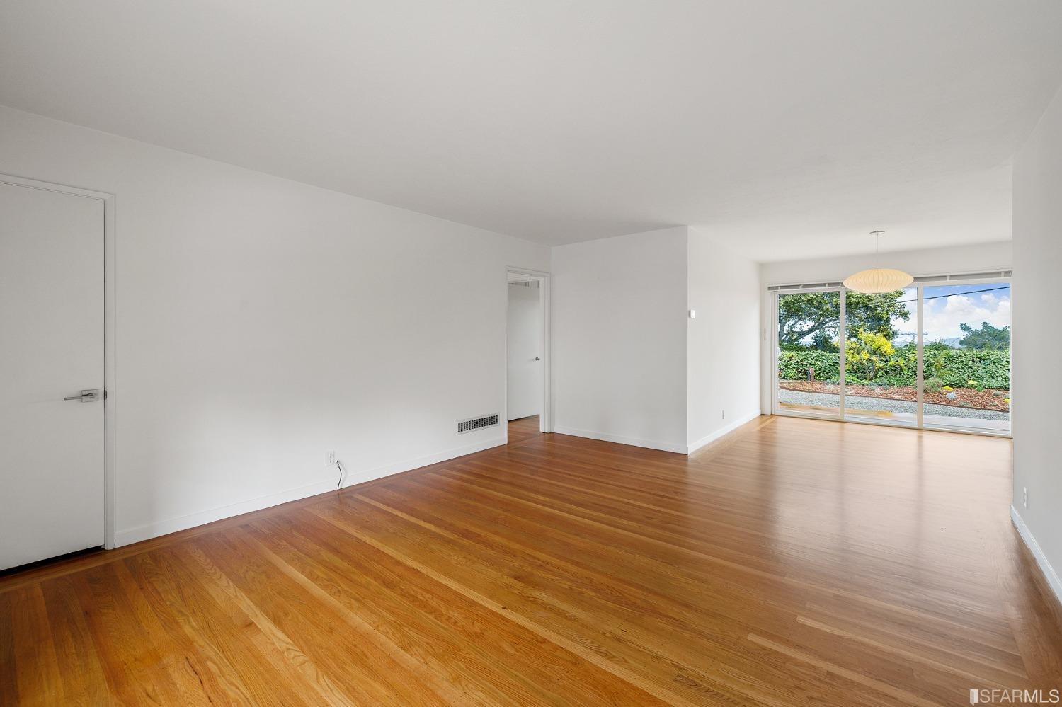 3101 Sunset Terrace San Mateo, CA 94403 - Photo 3 of 24 a view of empty room with wooden floor and fan
