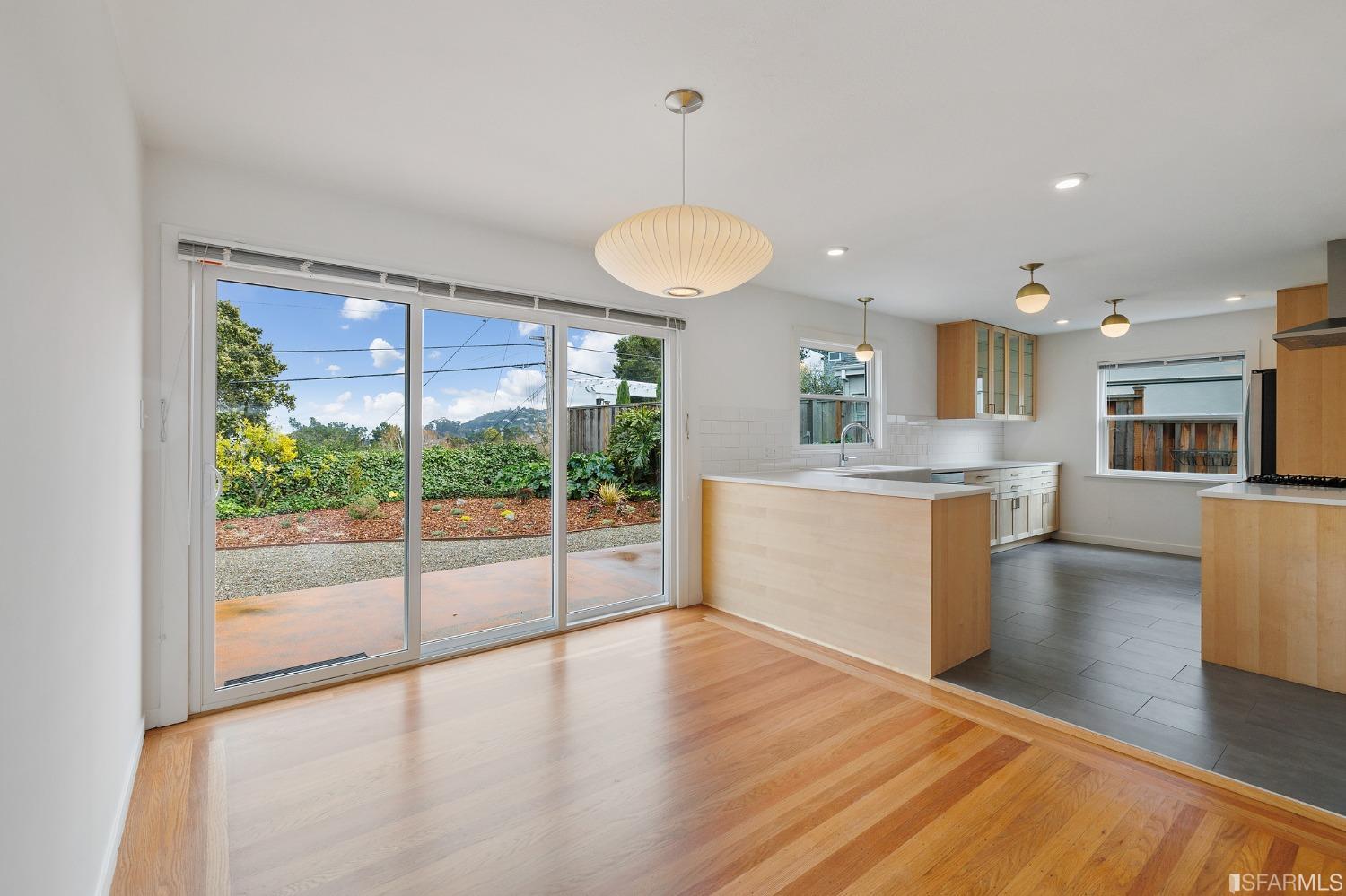 3101 Sunset Terrace San Mateo, CA 94403 - Photo 4 of 24 a view of a kitchen with furniture and wooden floor