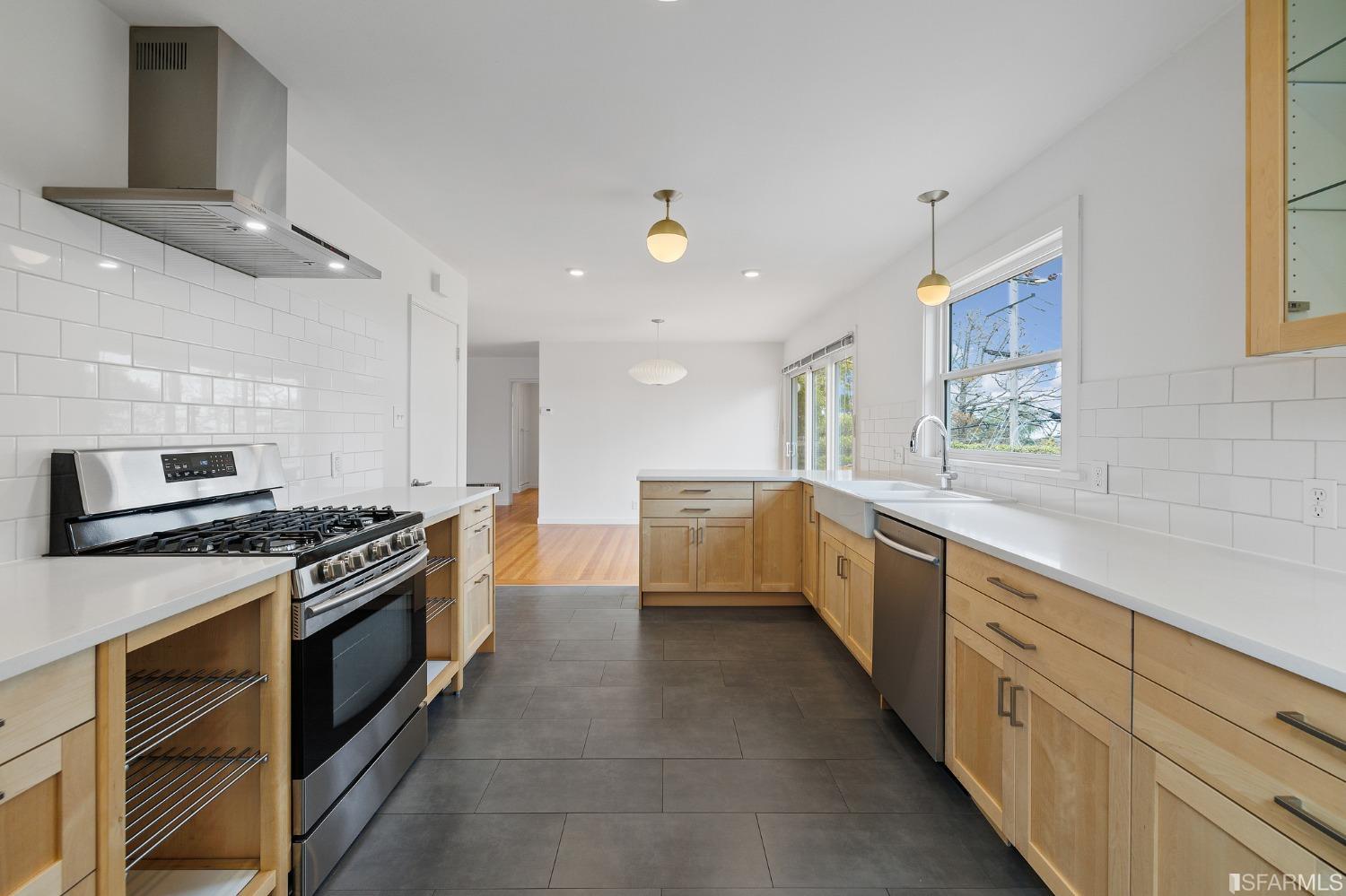 3101 Sunset Terrace San Mateo, CA 94403 - Photo 8 of 24 a large kitchen with a stove top oven